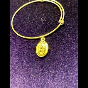 5/$50 Adjustable Silver Bracelet
With a silver double sided Medallion